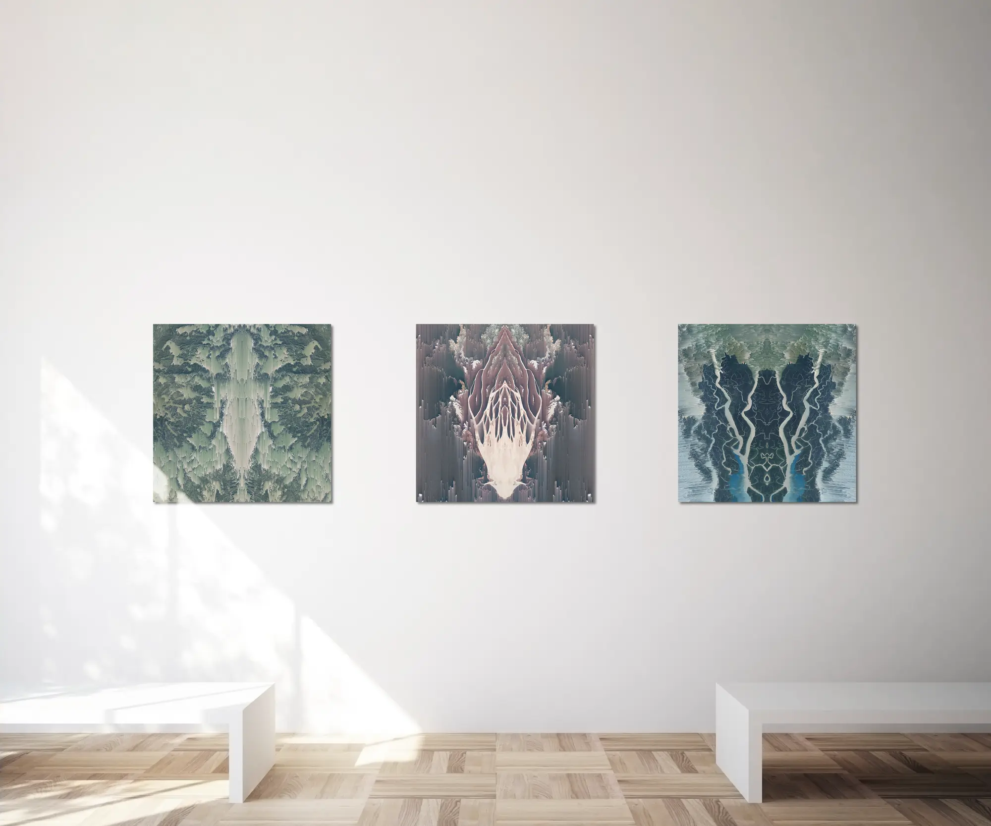 Three art prints on a white wall showing various digitally created motifs. Click on the image to go to the 'Artwork' subpage